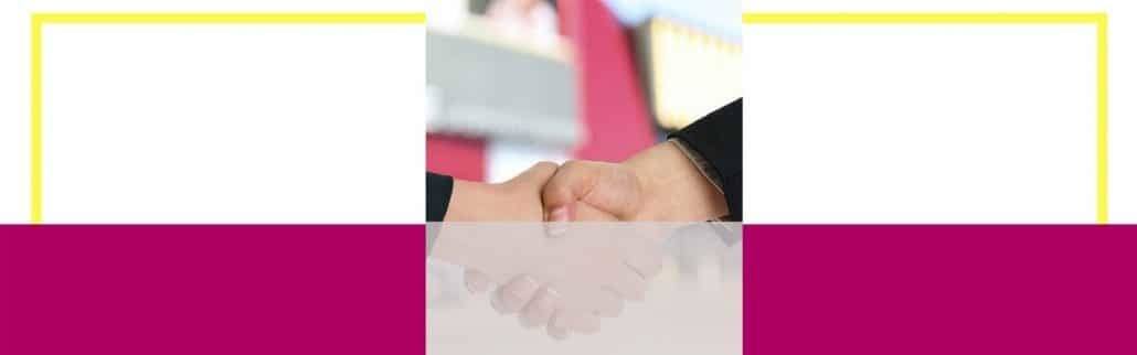 Two people shaking hands to represent the title: Negotiation skills A must in the Workplace